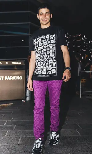 Zahir wearing Louis Vuitton t-shirt