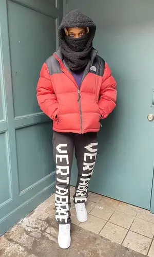 BoofPaxkMooky wearing Nike sneakers