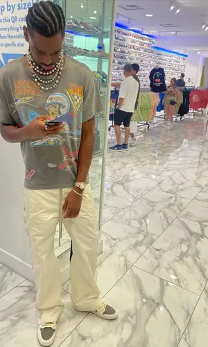 Shai wearing Vintage t-shirt