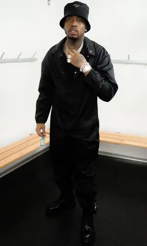 Fivio Foreign wearing Prada boots