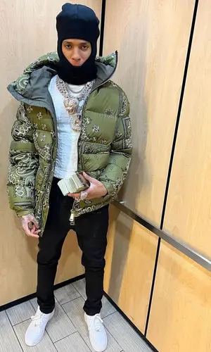 NLE Choppa wearing Khrisjoy jacket