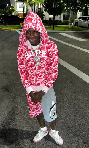 Quando Rondo wearing Bape shorts