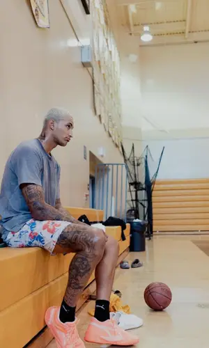 Kyle Kuzma wearing Puma shorts