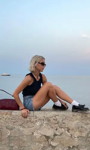 Emma Chamberlain wearing Gucci eyewear