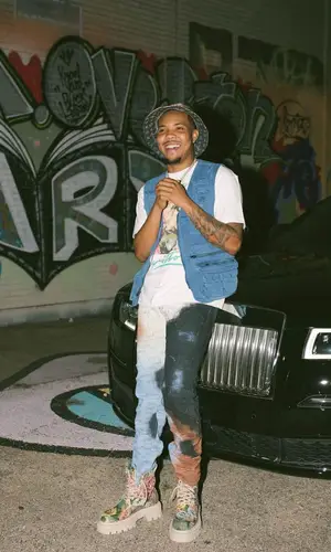 G Herbo wearing Louis Vuitton boots