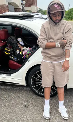 Babyface Ray wearing Balenciaga shorts