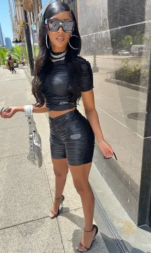Lakeyah wearing Balenciaga bag