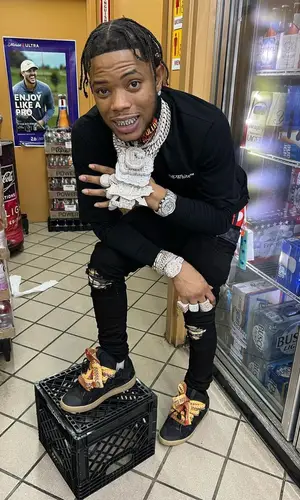 Lil Migo wearing Amiri jeans