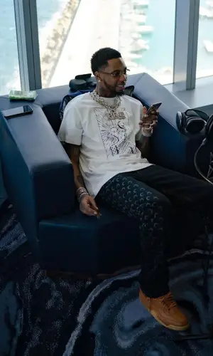 Key Glock wearing Marine Serre t-shirt