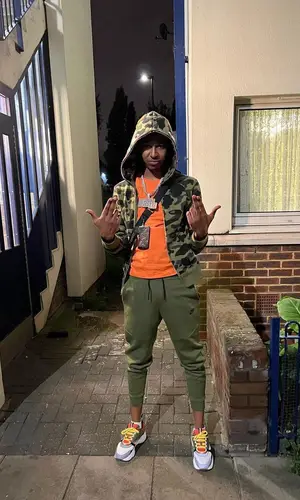 DigDat wearing Nike pants