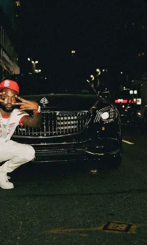 Meek Mill wearing Louis Vuitton t-shirt