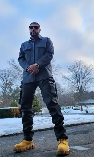 Badshah wearing Amiri pants