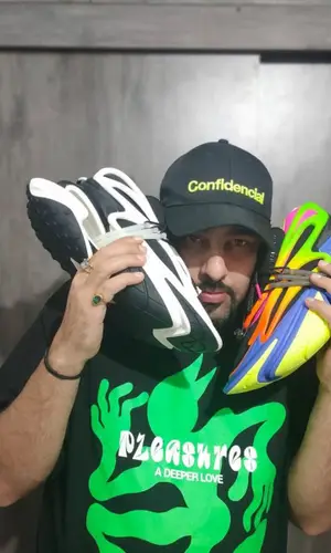 Badshah wearing Pleasures t-shirt