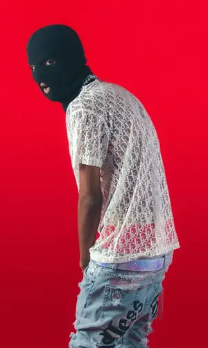 MC Stan wearing Louis Vuitton belt