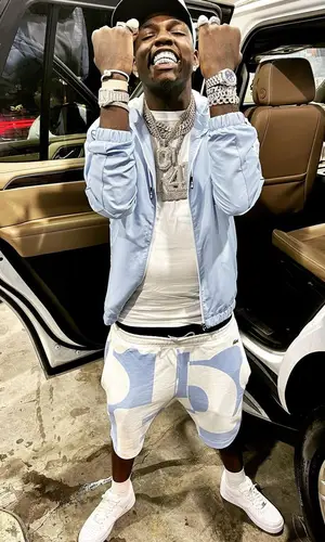 Big Boogie wearing Lacoste jacket