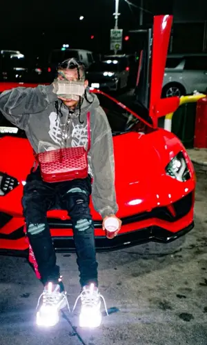 Sosmula’s Outfit in Amiri Jeans, Dior Sneakers & Goyard Bag (2022)
