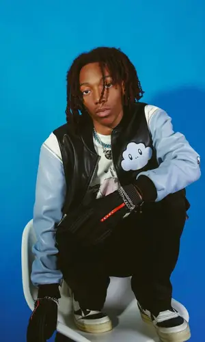 Lil Tecca wearing Prada glov