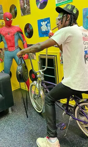 BigBabyGucci wearing Psychworld cap