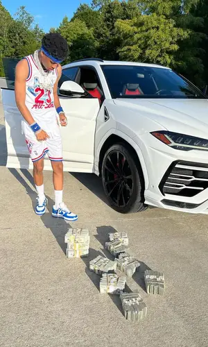 Nardo Wick wearing Mitchell & Ness shorts