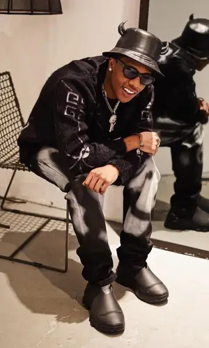 Smooky MarGielaa wearing Givenchy bag