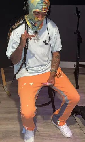 Lil Dude wearing Gallery Dept. pants