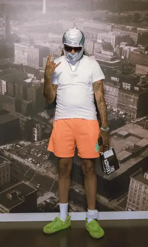 Lil Dude wearing Eric Emanuel shorts