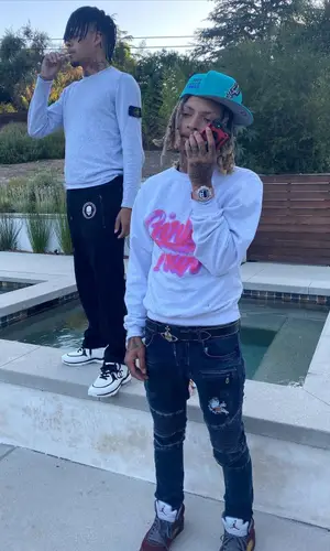 Summrs wearing Number (N)ine pants