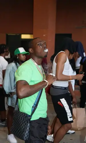 Bobby Shmurda wearing Givenchy shorts