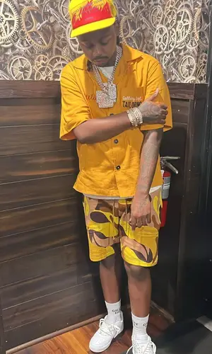 Babyface Ray wearing Marni shorts