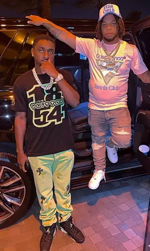 Don Q wearing Casablanca t-shirt