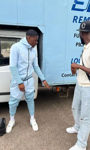 Jay1 wearing Nike sneakers