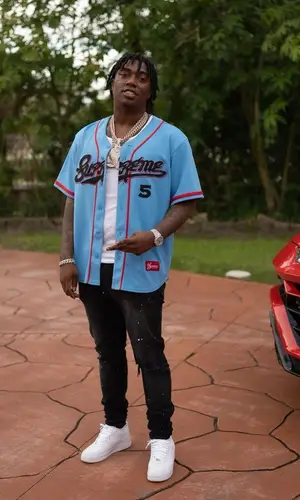 Fredo Bang wearing Amiri jeans