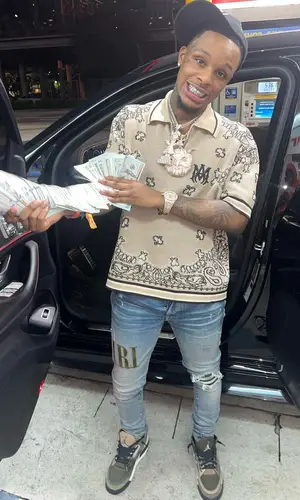 Toosii wearing Amiri hat