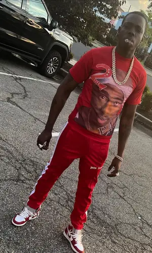 Bobby Shmurda wearing Palm Angels pants