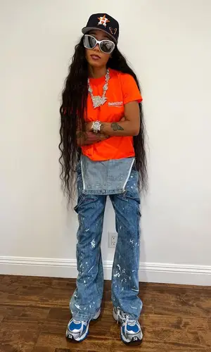 Coi Leray wearing Balenciaga eyewear