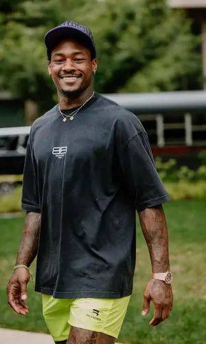 Stefon Diggs’ Outfit in Balenciaga T-Shirt & Louis Vuitton Cap (2022)