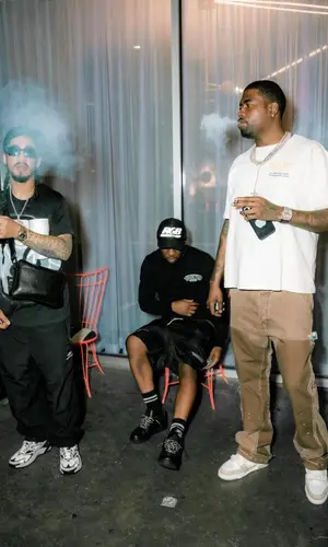 G.T. wearing Louis Vuitton cap