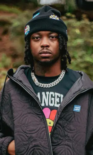 JetsonMade wearing New Era hat