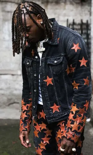 Flipp Dinero wearing Nike sneakers