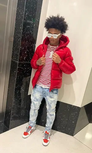 Mikey wearing Moncler jacket