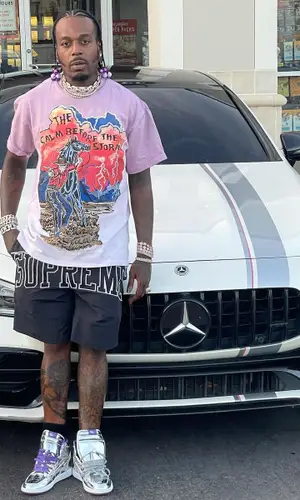 Sauce Walka wearing Warren Lotas t-shirt