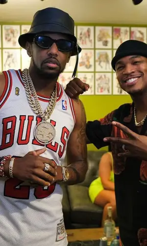Fabolous wearing Mitchell & Ness jersey