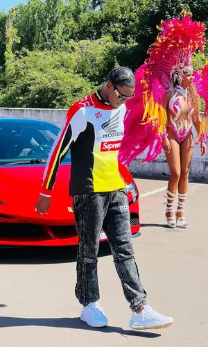 Negrito wearing Supreme jacket