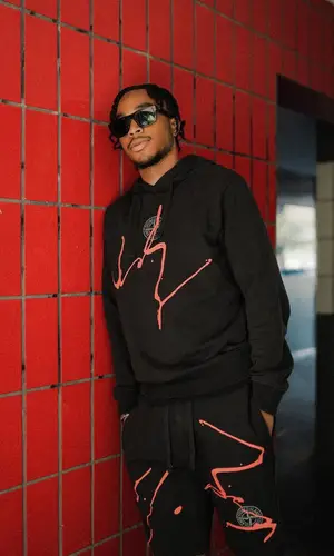 Bne wearing Prada sneakers