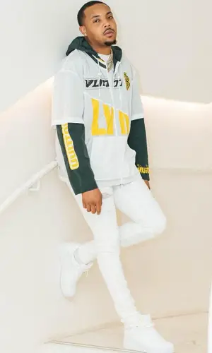 G Herbo wearing Louis Vuitton jersey