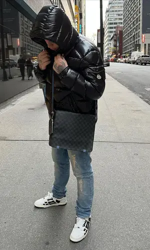 YP4AM wearing Amiri sneakers