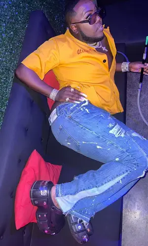 Saucy Santana wearing Gallery Dept. jeans