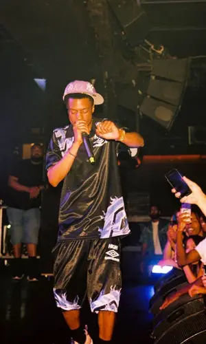 Pierre Bourne’s Outfit in Umbro Shirt, Loso NYC Cap & High Company (2022)