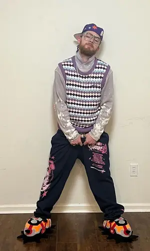 Angus Cloud wearing Happy99 pants