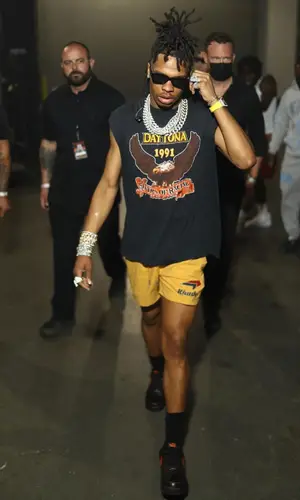 Lil Baby wearing Rhude swimwear